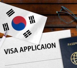 Flag of South Korea, visa application form and passport on table